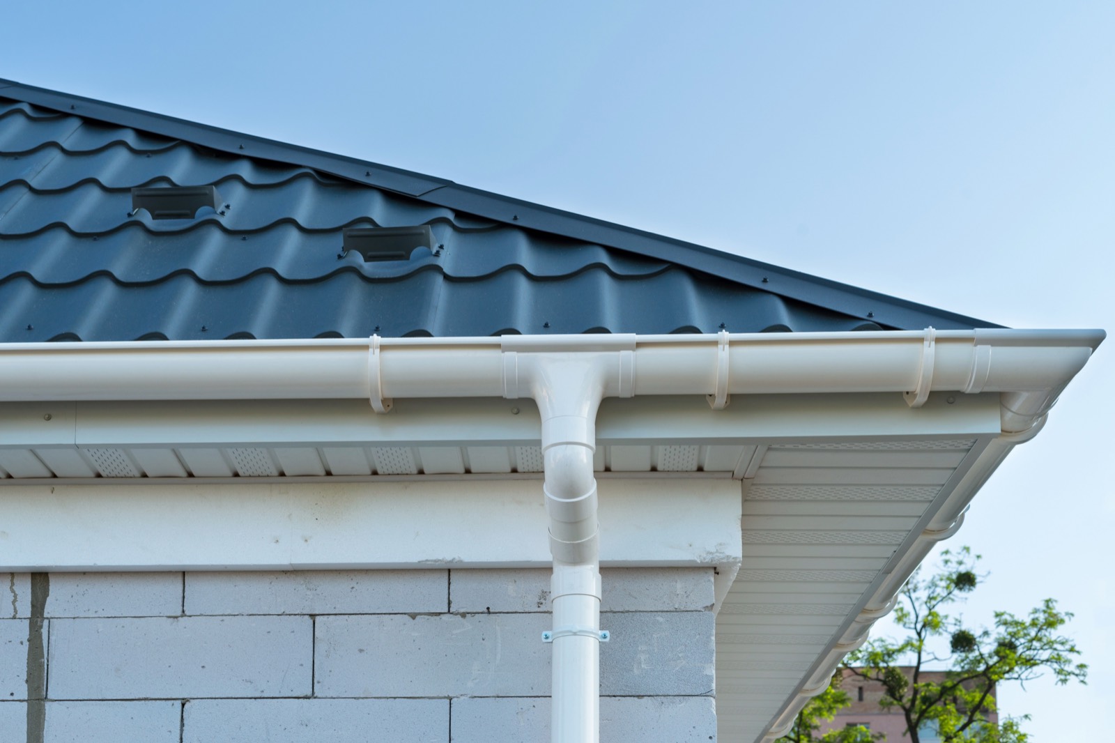 Seamless gutters installed along a roofline